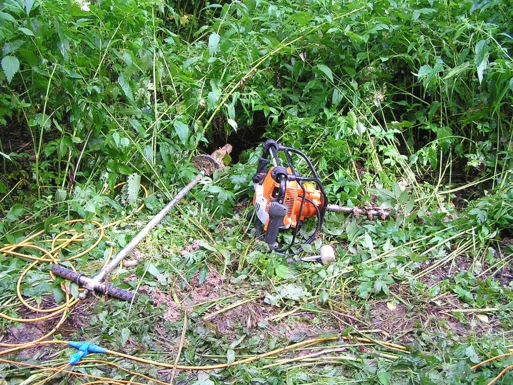 12-gauge seismic source and portable drilling tool
