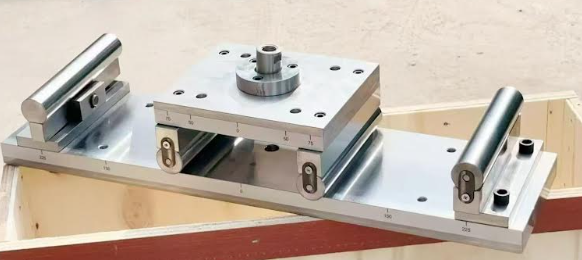 Dispositivo para pruebas de flexion para vigas de hormigon